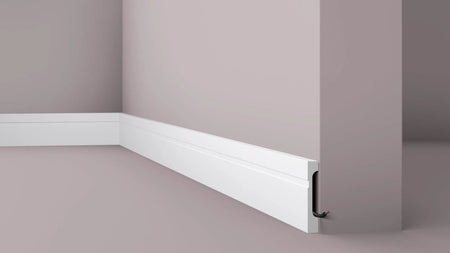 FD11 2M WALLSTYL SKIRTING BOARD - Skirtings with cable channel corner detail on a light-colored wall| DecorMania UK 