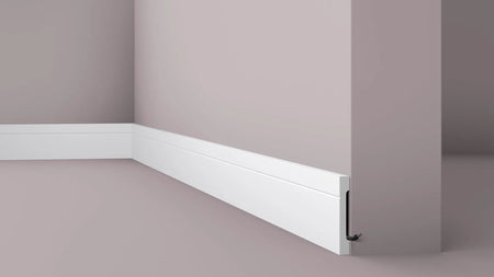 FD2 2.44M WALLSTYL SKIRTING BOARD - Skirtings with cable channel owner detail on a light-colored wall| DecorMania UK 