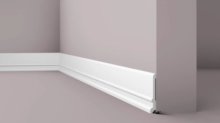 FD21 2M WALLSTYL SKIRTING BOARD with cable channel corner detail on a light-colored wall | DecorMania UK 