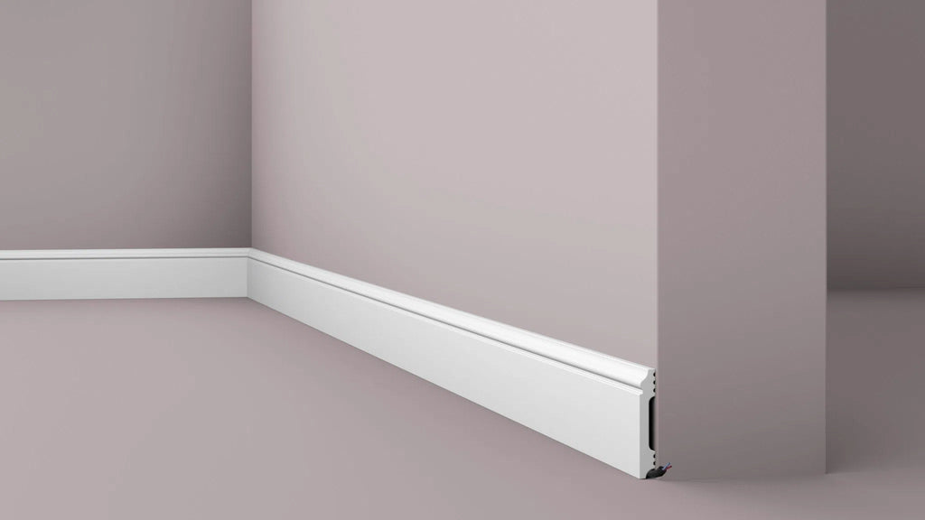 FL1 2.44M WALLSTYL SKIRTING BOARD - Skirtings with cable channel owner detail on a light-colored wall | DecorMania UK