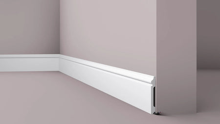 FL2 2M WALLSTYL SKIRTING BOARD - Skirtings with cable channel owner detail on a light-colored wall | DecorMania UK