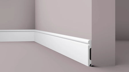 FL4 2M WALLSTYL SKIRTING BOARD - Skirtings with cable channel owner detail on a light-colored wall | DecorMania UK | DecorMania UK 